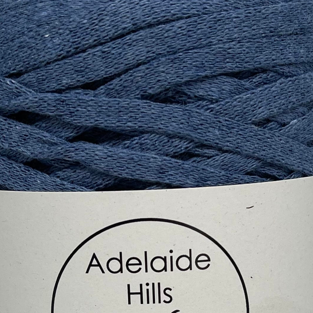 Where can I find Ribbon Yarn Denim? Our Ribbon Yarn is a beautifully soft woven tape-like fibre perfect for use with crochet, knitting, weaving or any fibre art. Made from 100% recycled fibres.   Length: 130metres +/-  Weight: 250gms +/-  For use with approx 7mm or above hooks depending on your project   