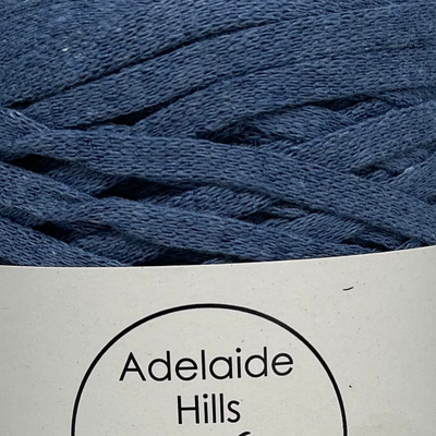 Where can I find Ribbon Yarn Denim? Our Ribbon Yarn is a beautifully soft woven tape-like fibre perfect for use with crochet, knitting, weaving or any fibre art. Made from 100% recycled fibres.   Length: 130metres +/-  Weight: 250gms +/-  For use with approx 7mm or above hooks depending on your project   