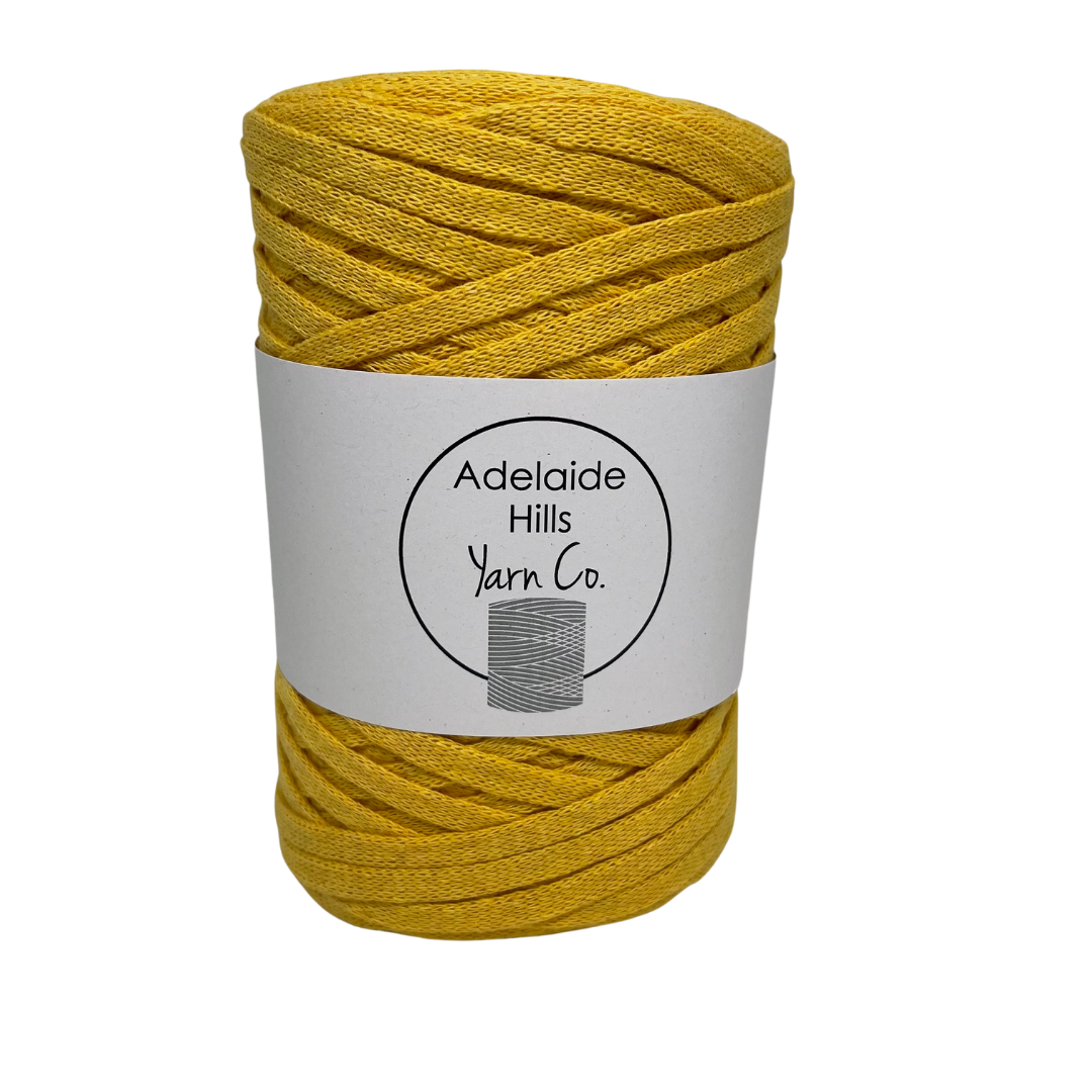 Where can I find Ribbon Yarn Turmeric? Our Ribbon Yarn is a beautifully soft woven tape-like fibre perfect for use with crochet, knitting, weaving or any fibre art. Made from 100% recycled fibres.   Length: 130metres +/-  Weight: 250gms +/-  For use with approx 7mm or above hooks depending on your project   